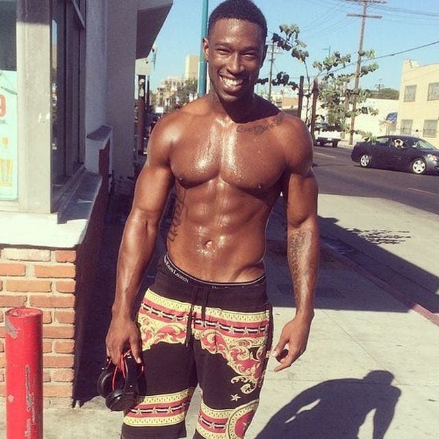 Kevin McCall shirtless on a street in Los Angeles