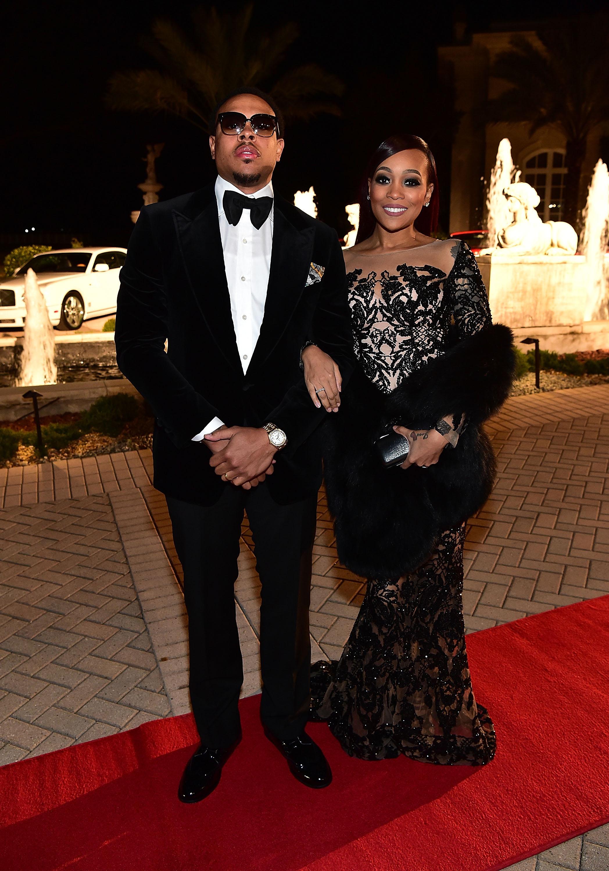 Shannon Brown and Monica at a formal event on a red carpet